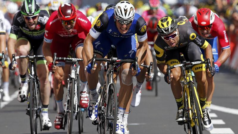 Etixx-Quickstep rider Marcel Kittel of Germany wins on finish line. Photo: Jean-Paul Pelissier/Reuters