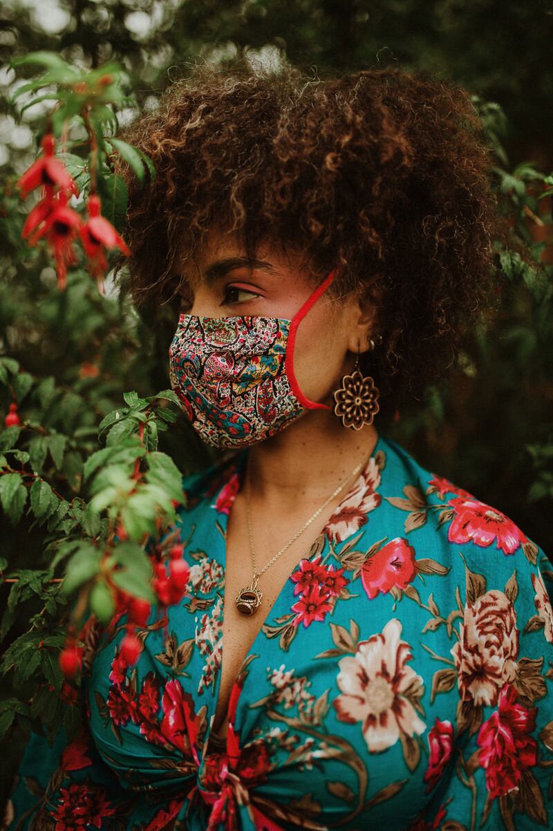 Liberty print triple layer cotton mask €30, made to order in a choice of prints. Electric Rose top €129, earrings handpainted by Libbysloom. Photograph: Kate Bean