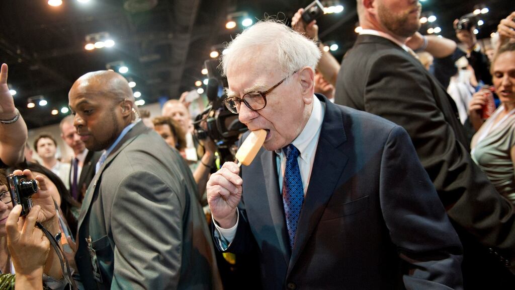Warren Buffett’s Berkshire Hathaway reduced its investments in Goldman Sachs and Wal-Mart Stores as the billionaire freed up cash ahead of the completion of one of his largest acquisitions. (Photograph: Daniel Acker/Bloomberg)