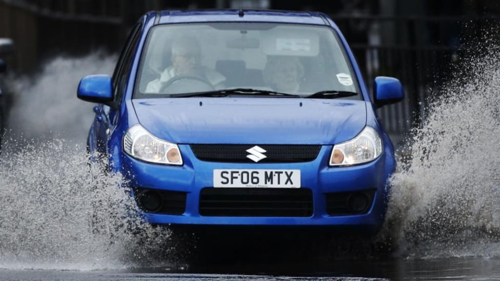 Road travel in parts of Northern Ireland has been disrupted by debris, fallen trees and flooding. Photograph: PA