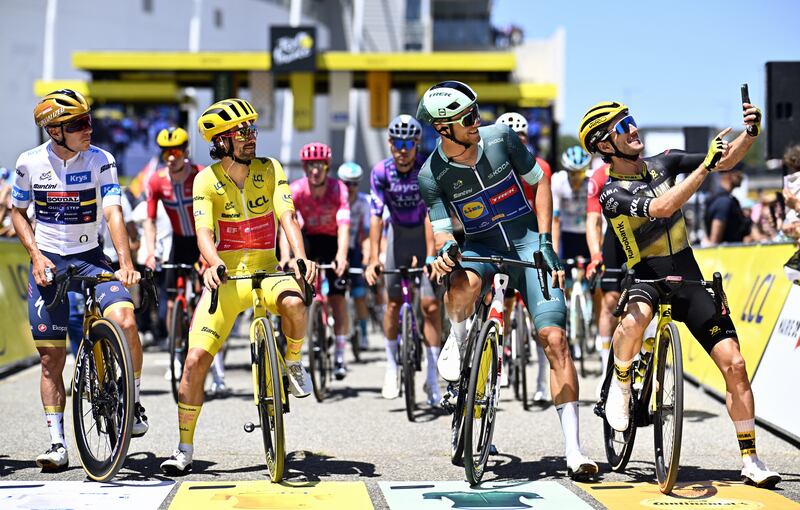 Remco Evenepoel (white), Ben Healy (yellow) and Jonathan Milan (green) at the start of the 11th stage of the 2025 Tour de France. Photograph: Jasper Jacons/BELGA MAG/AFP via Getty Images