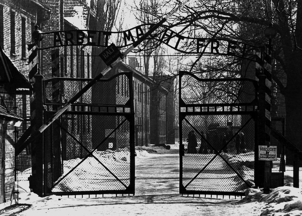 The entrance gate to Auschwitz concentration camp, 1940s. Photograph: Mondadori/Getty
