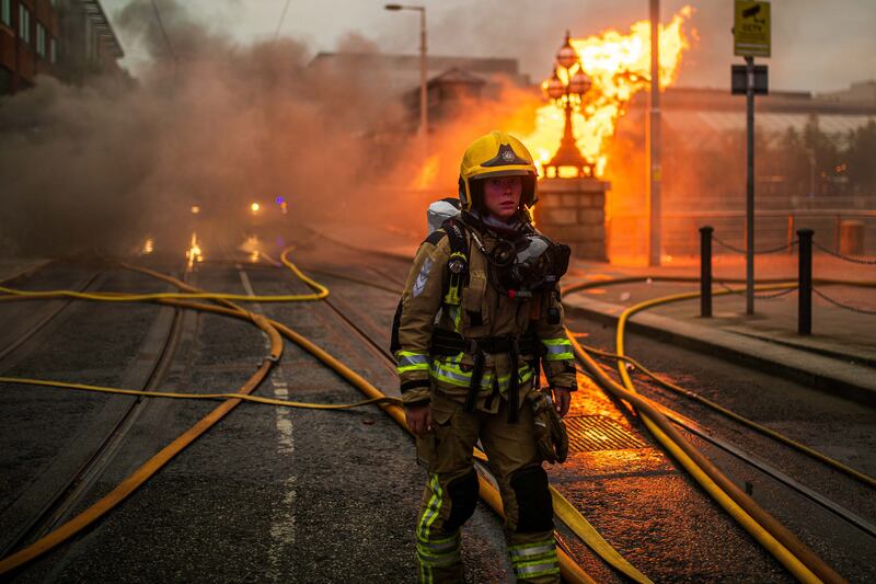 Firefighters battled intense flames at George’s Dock in Dublin after a major blaze broke out Tuesday evening. Photograph: Damien Storan