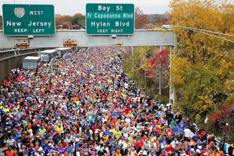 Runners wait at the starting line prior to crossing the Verrazano-Narrows Bridge at the start of the New York City Marathon in Staten Island in 2015. Photograph: Mike Stobe/Getty Images