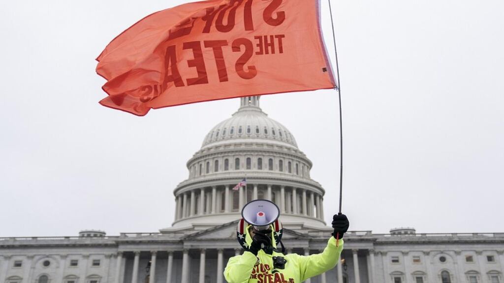 A ’Stop the Steal’ protester outside the Capitol in Washington, three days before a mob incited by former US president Donald Trump stormed it. Photograph: Stefani Reynolds/The New York Times
