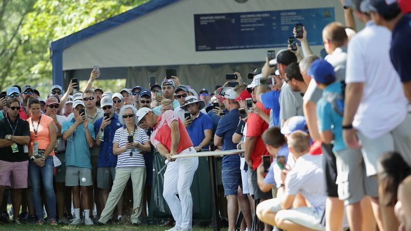 Woodland plays his second shot on the 18th during round two. Photo: Richard Heathcote/Getty Images