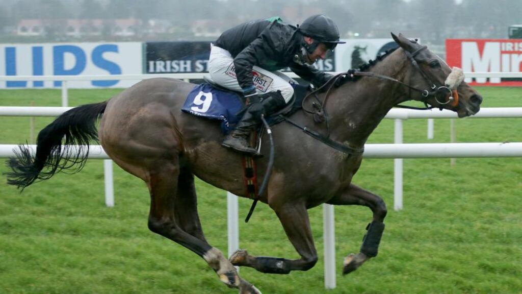 Rock On The Moor held off the challenge of Analifet to win the punchestown.com Mares Hurdle. Photograph: Inpho.