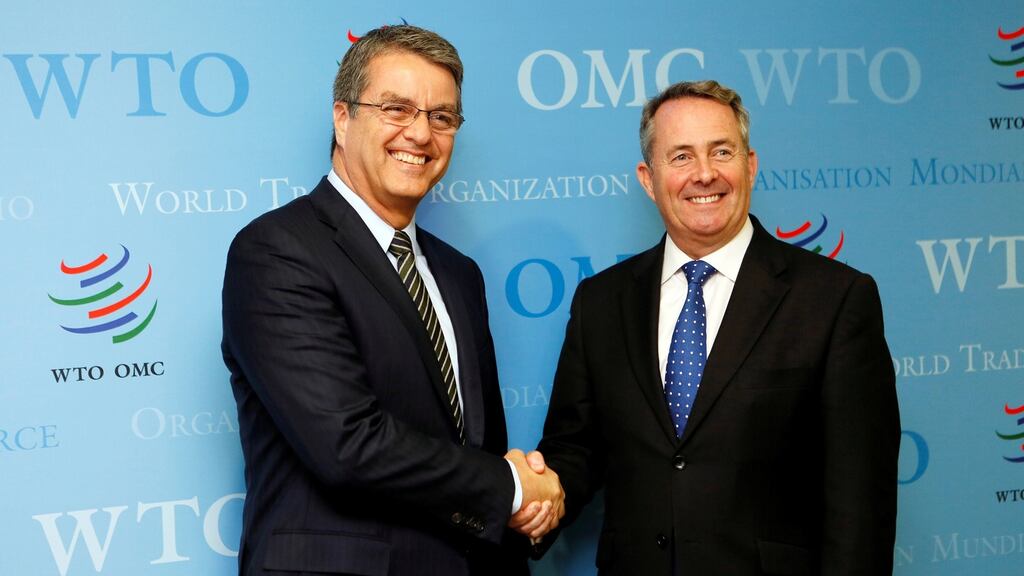 Roberto Azevedo (left), Director-General of the World Trade Organization (WTO), greets Britain’s International Trade Secretary Liam Fox (right) before a meeting in Geneva, Switzerland. Photograph: Pierre Albouy/Reuters