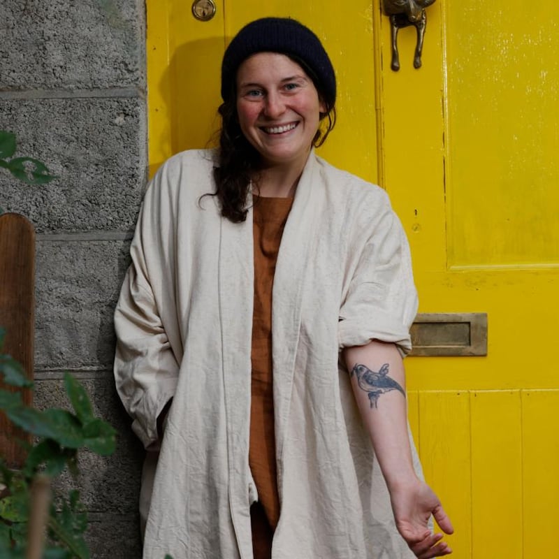 Kerri Ní Dochartaigh with her tattoo of a canary. Photograph: Alan Betson