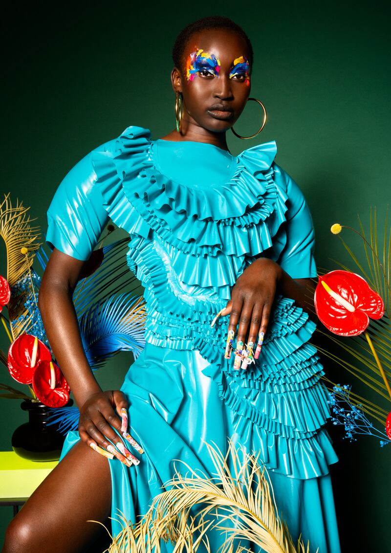 Izzy O’Reilly “Rubber Match” latex inflatable dress