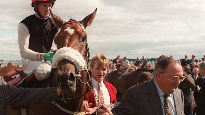 Stan Cosgrove  leading in Dance Design ridden by MJ Kinane after winning the Kildangan Stud Irish Oaks at the Curragh. Photograph: Jack McManus
