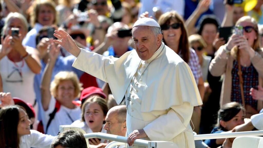 Pope Francis salutes the crowd as he arrives for his weekly general audience in St Peter’s Square on Wednesday. Speaking to an Argentinean newspaper, he said he has not watched television since 1990. Photograph: Alberto Pizzoli/AFP/Getty Images