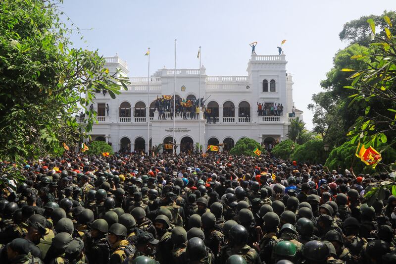 Anti-government protesters outside the office of Sri Lanka's prime minister in Colombo on Wednesday. Photograph: AFP via Getty Images
