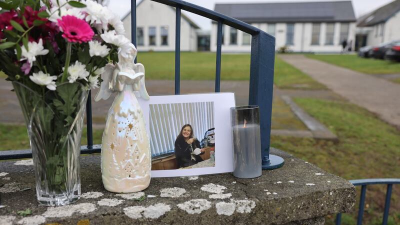 Floral tributes at Scoil Naomh Colmcille, Durrow, Co Offaly, where Ashling Murphy was a teacher. Photograph: Dara Mac Dónaill