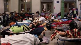 More Ukrainians flee across borders in freezing temperatures