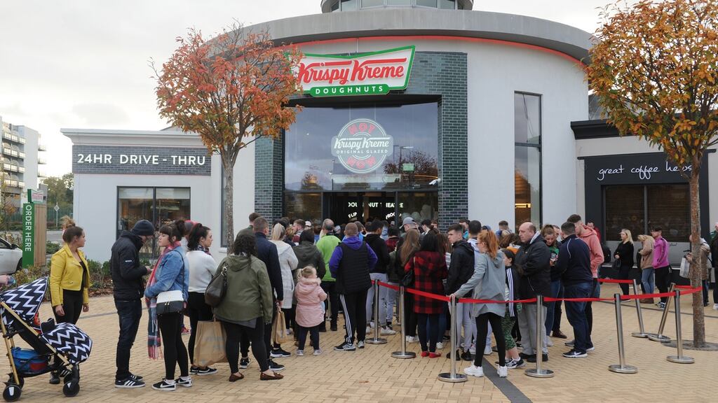 People queue outside the newly opened Krispy Kreme outlet at Blanchardstown Shopping Centre last year. File photograph: Aidan Crawley
