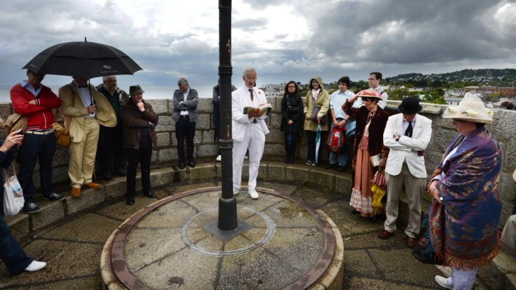 Robert Nicholson, curator of the James Joyce museum at the Joyce Tower at Sandycove, reads from Ulysses on Bloomsday. Photograph: Cyril Byrne