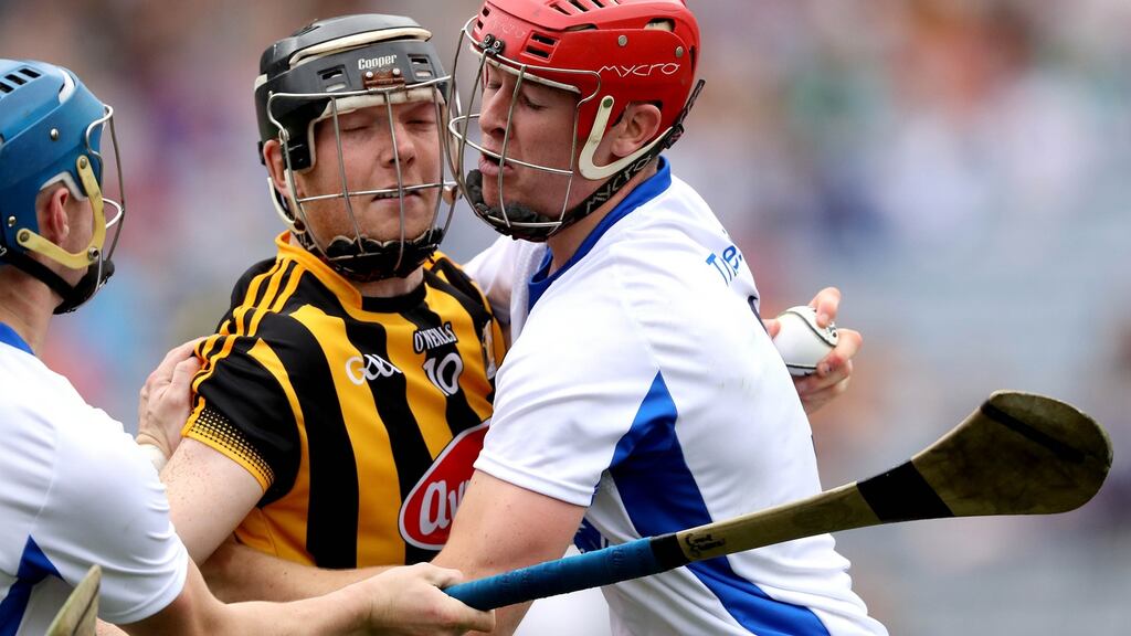 Kilkenny’s Walter Walsh is tackled by Waterford’s Tadhg De Burca during last Sunday’s semi-final clash at Croke Park. Photograph: Ryan Byrne/Inpho