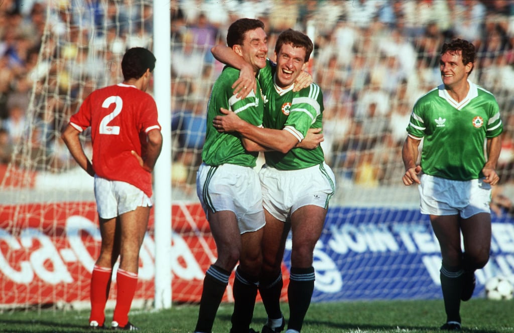 John Aldridge celebrates scoring with Kevin Sheedy against Malta in 1989. Photograph: Billy Stickland/Inpho