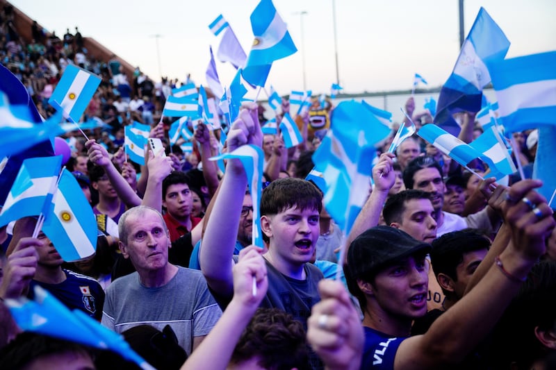 Supporters of Argentinian president Javier Milei waiting for his arrival to a closing campaign rally ahead the midterm elections, in Rosario, Argentina. Photograph: Tomas Cuesta/Getty Images