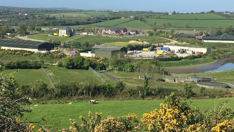 The Rossbracken waste site complex with Rossbracken House top left, the red building Wonder Years Childcare day care pre-school (centre), and, bottom right, the retaining wall helping conceal a large illegal dump. Photograph: Peter Murtagh
