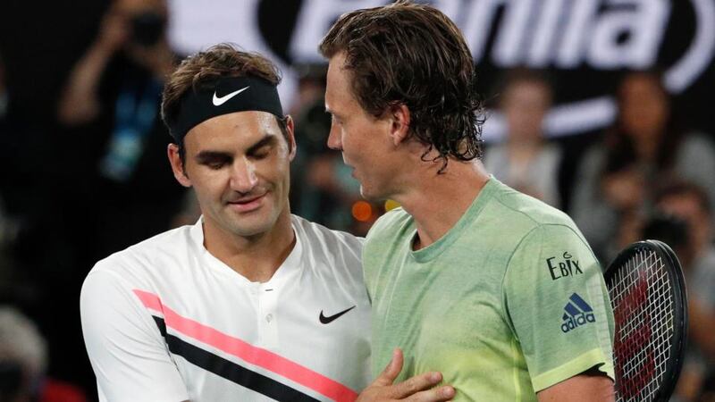 Roger Federer with Tomas Berdych after his straight sets win in Melbourne. Photograph: Edgar Su/Reuters