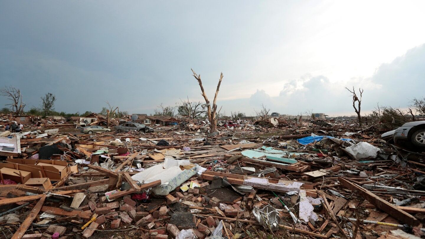 Debris covers the ground after a powerful tornado ripped through the area in Moore, Oklahoma. Photograph: Brett Deering/Getty Images