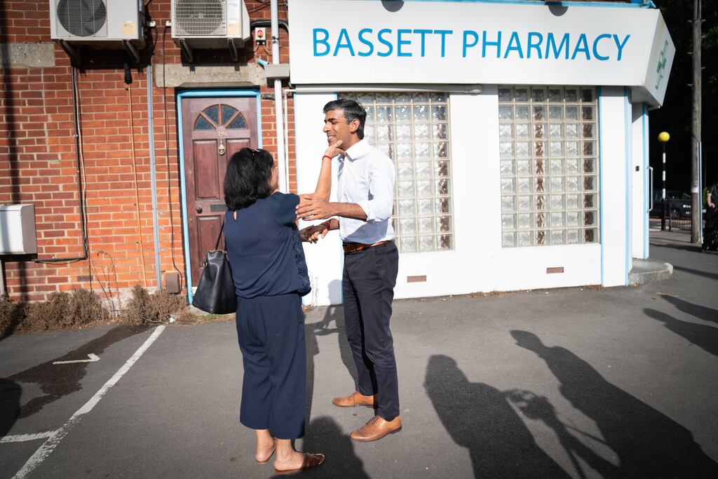 Rishi Sunak meeting an old family friend during a visit to Southampton as part of his campaign to be leader of the Conservative Party and the next prime minister. Photograph: Stefan Rousseau/PA