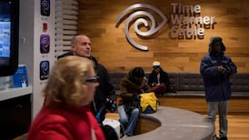 Tycoon and ex-boss vie for Time Warner