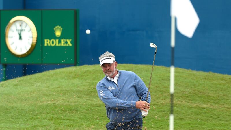 Darren Clarke plays out of the sand on the 18th green at the 2017 Dubai Duty Free Irish Open at Portstewart Golf Club, Derry, Northern Ireland. Photograph: Presseye/Matt Mackey/Inpho