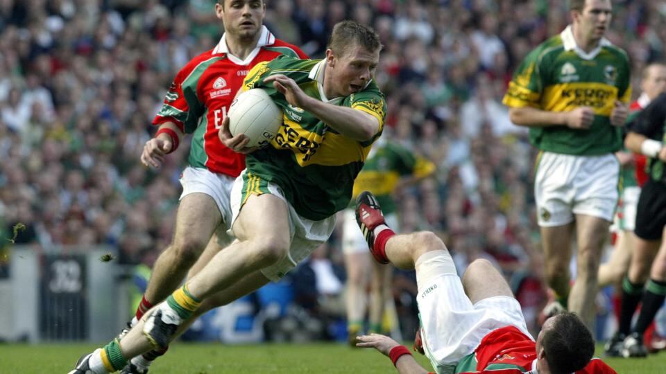 Tomás Ó Sé bursts past Alan Dillon of Mayo during the 2004 All-Ireland final: Photograph: Andrew Paton/Inpho