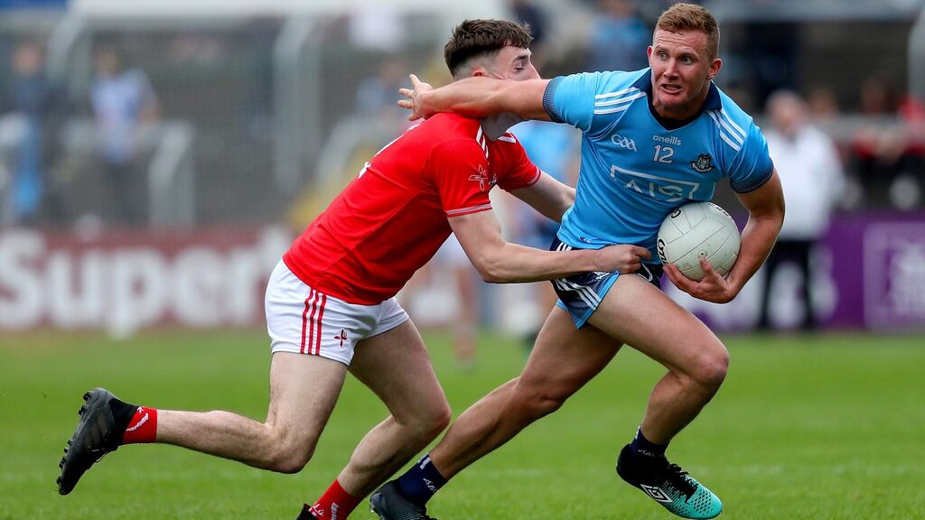 Dublin’s Ciaran Kilkenny with Louth’s Fergal Donohue during the Leinster championship clash at O’Moore Park, Portlaoise. Photograph: Oisin Keniry/Inpho