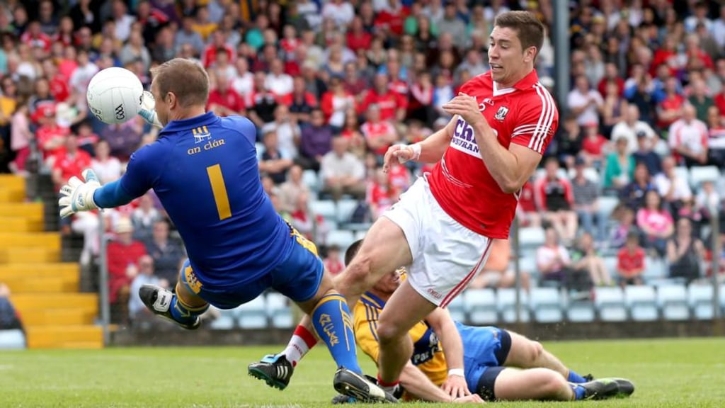 Cork’s Conor Dorman has his shot saved by goalkeeper Joe Hayes of Clare. Photograph: Inpho/James Crombie