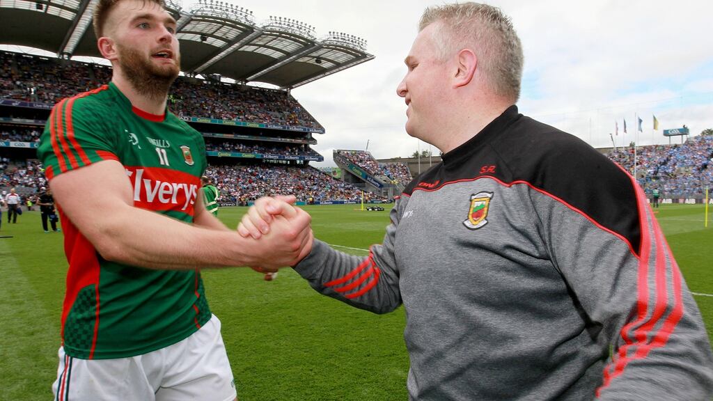 Job done: Aidan O’Shea is congratulated by Mayo manager Aidan O’Shea after the victory over Tyrone. Photograph: Lorraine O’Sullivan/Inpho