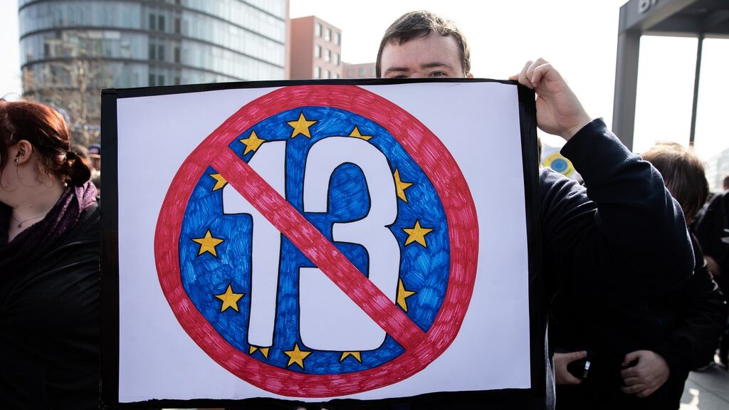 A protester holds a banner against Article 13 during the ‘Save The Internet’ demonstration in Berlin last weekend. Photograph: Omer Messinger/EPA