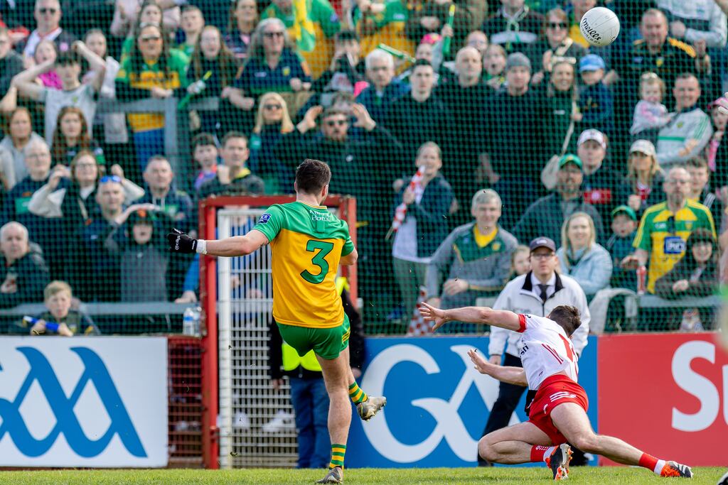 Donegal's Brendan McCole kicks the equalising point to bring the match to extra-time in the Ulster SFC semi-final against Tyrone. Photograph: Morgan Treacy/Inpho