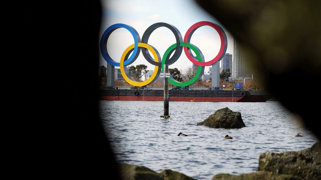 The Olympic rings floating in the water in the Odaiba section in Tokyo. Photo: Eugene Hoshiko/AP Photo