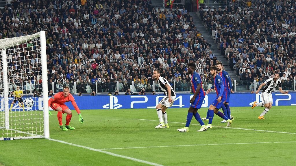 Juventus’ Giorgio Chiellini scores his side’s third goal in their Champions League quarter-final clash with Barcelona. Photo: Andrea Di Marco/EPA