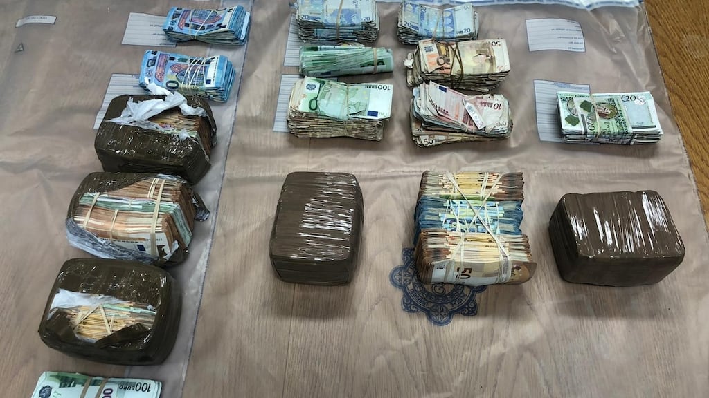 Consignments of cash totalling €700,000 were seized by gardaí. Photograph: Garda Press Office