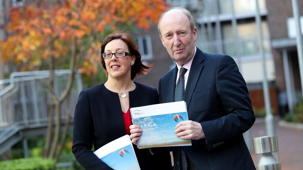 Chief executive of the National Transport Authority Anne Graham and Minister for Transport, Sport and Tourism Shane Ross: Mr Ross said the Dún Laoghaire harbour company faced a challenging financial and operating environment as it moved from commercial shipping activities towards a focus on marine leisure and marine-related tourism. Photograph: Maxwells