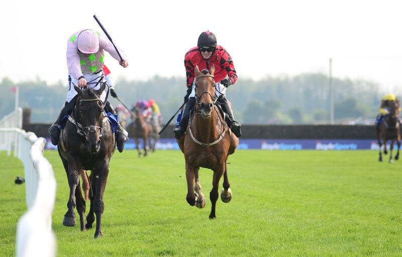 Burrows Saint and Ruby Walsh (both left) race during day two of the Fairyhouse Easter Festival at Firehouse Racecourse on April 22nd. Photograph: PA Wire.