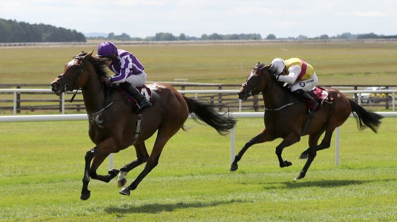 Magical ridden by Ryan Moore (left) wins The Kilboy Estate Stakes during day two of the Darley Irish Oaks Weekend at Curragh Racecourse, Co Kildare. Photograph: Niall Carson/PA Wire