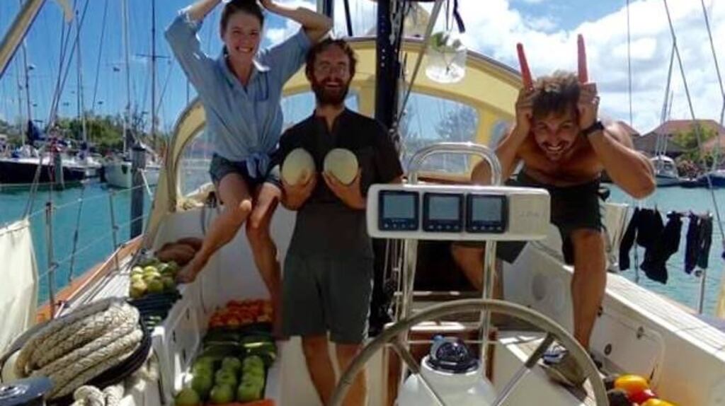 Claire McCluskey and Nick Russell with David van der Möllers and their supplies before leaving port in Antigua.
