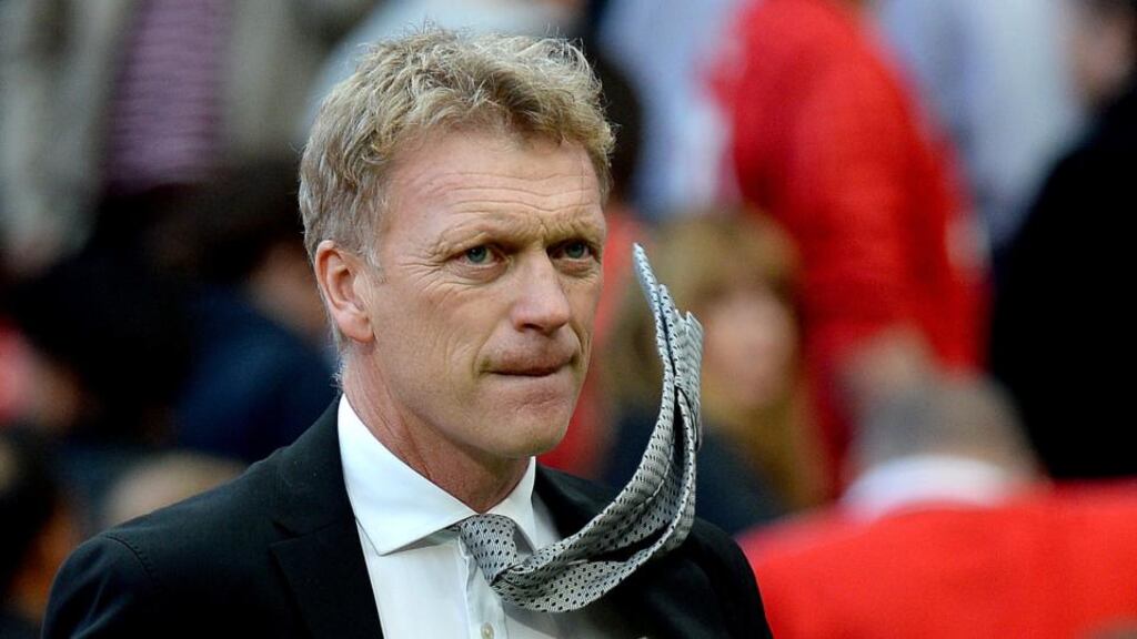 Manchester United manager David Moyes leaves the pitch after the 2-1 defeat to West Bromwich Albion at Old Trafford, Manchester. Photograph: Martin Rickett/PA