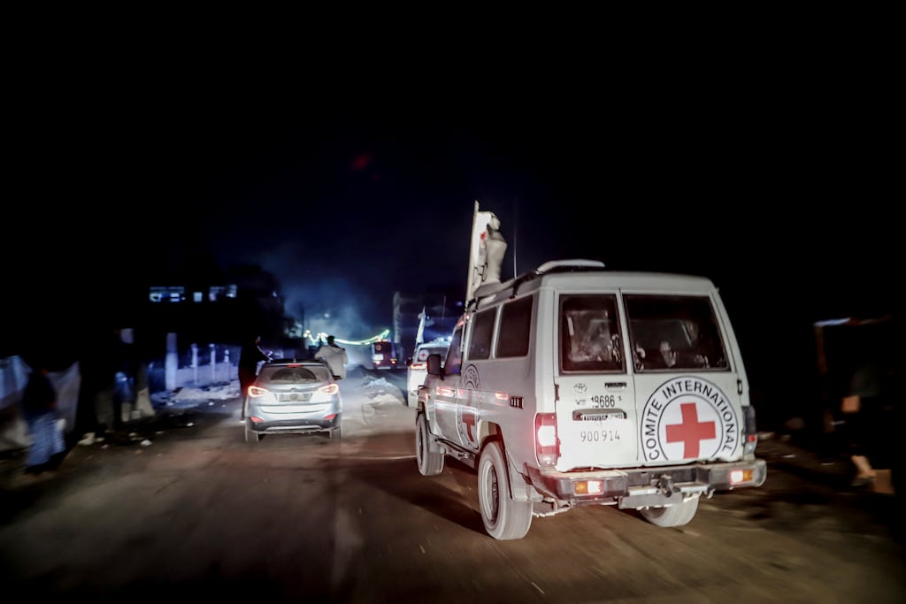 Red Cross vehicles transport the body of an Israeli captive handed over by Hamas on Tuesday. Photograph: Saeed Jaras/ Middle East Images/AFP via Getty Images