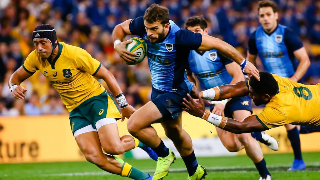 Argentina’s Ramiro Moyano beats a diving tackle by Australia’s Isi Naisarani during the Rugby Championship match at Lang Park in Brisbane on. Photograph: Patrick Hamilton/AFP/Getty Images