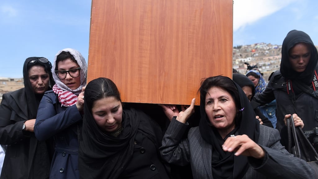 Independent Afghan civil society activist women carry the coffin of Farkhunda. Photograph: Wakil Kohsar/AFP/Getty Images
