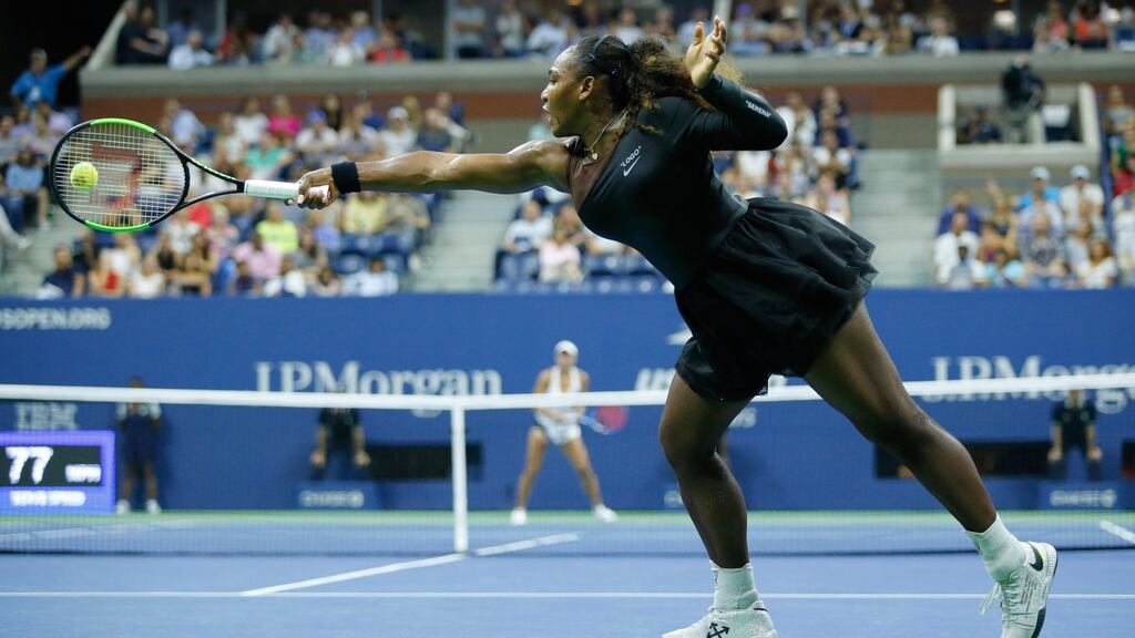 Serena Williams hits a return to Magda Linette during their 2018 US Open women’s singles match. Photo Eduardo Munoz Alvarez/Getty Images