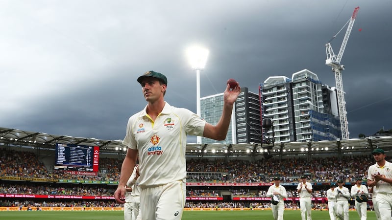 Cummins salutes the crowd after taking five wickets. Photo: Jason O’Brien/PA Wire