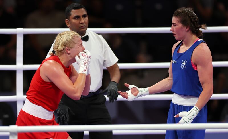 Elzbieta Wojcik of Poland reacts after being declared the winner over an unfortunate Aoife O'Rourke. There was widespread criticism of the judges' decision. Photograph: James Crombie/Inpho